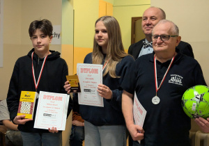 Miłosz w gronie tryumfatorów.